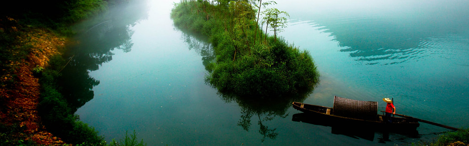 Morning mist rising off Dongjiang Lake near Chenzhou